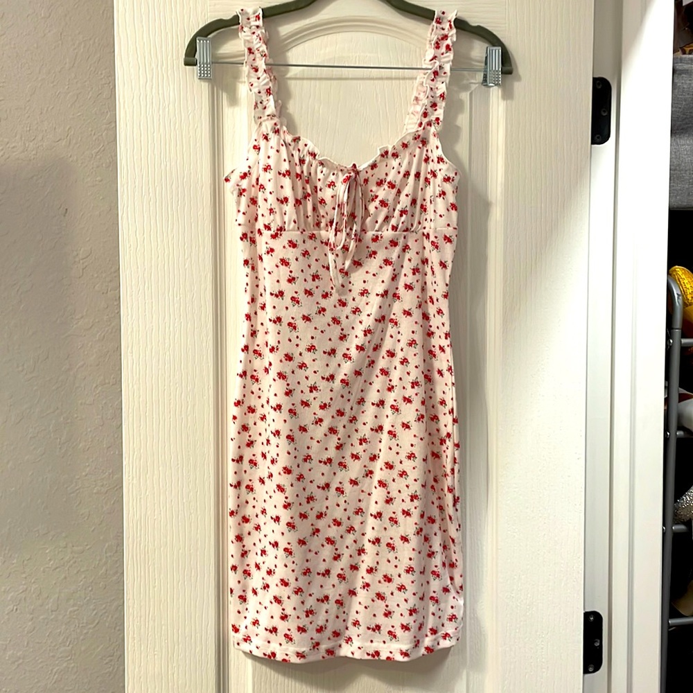 TWO tight-fitting good quality dresses. White one is shorter than the blue.